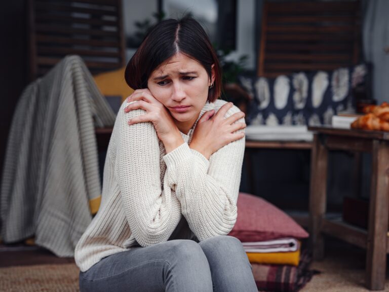 Mental health, anxiety depressed thinking chinese lady.